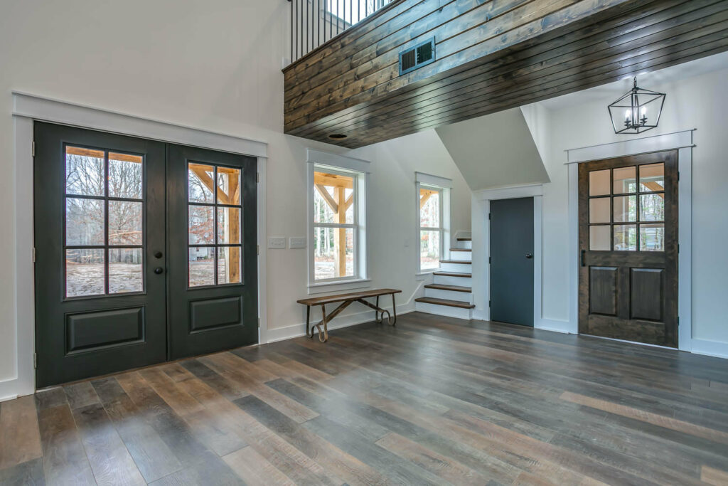 Main entrance from interior, stairs to second floor