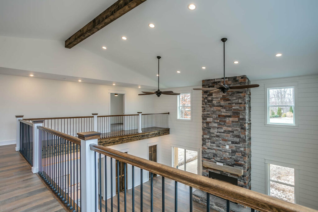 First floor and fireplace view from mezzanine