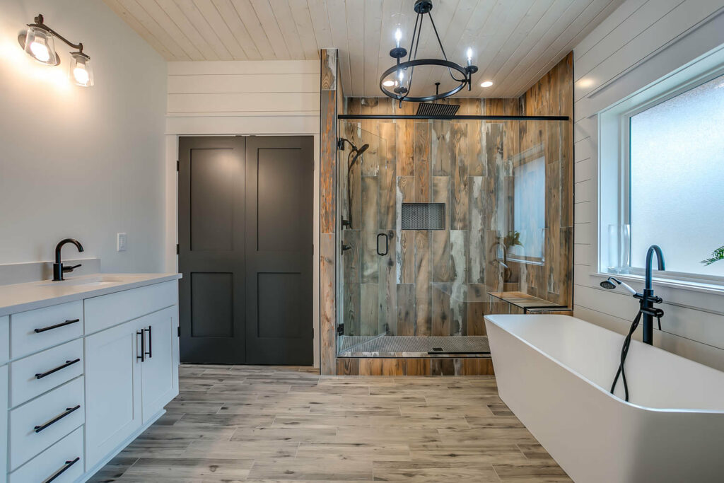 Master Bathroom with sink, shower, and tub