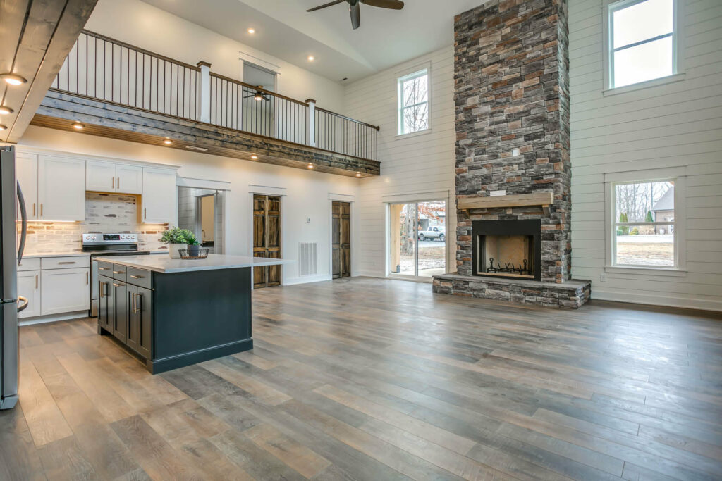 Interior with center island and fireplace